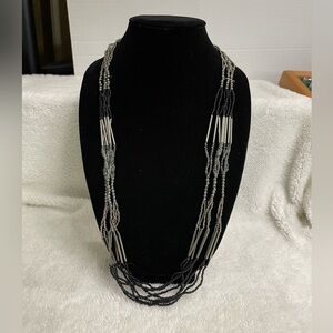 Apostrophe multi-layer beaded necklace